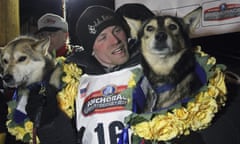 Iditarod-Things to Know, Dallas Seavey<br>FILE - In this March 15, 2016, file photo Dallas Seavey posing with his lead dogs Reef, left, and Tide after finishing the Iditarod Trail Sled Dog Race in Nome, Alaska. Four-time Iditarod champion Dallas Seavey denies he administered banned drugs to his dogs in this year’s race, and has withdrawn from the 2018 race in protest. The Iditarod Trail Committee on Monday, Oct. 23, 2017, identified Seavey as the musher who had four dogs test positive for a banned opioid pain reliever after finishing the race last March in Nome. (AP Photo/Mark Thiessen, File)