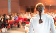 Female academic lecturing at university.