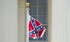 A Confederate flag flies on the grounds of the Alabama Capitol building in Montgomery, Ala., Monday, June 22, 2015. (Albert Cesare/The Montgomery Advertiser via AP) NO SALES; MANDATORY CREDIT