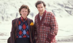 Ford Prefect (DAVID DIXON) and Arthur Dent (SIMON JONES) dressed in dressing gown on a strange planet in the classic sci-fi comedy series.