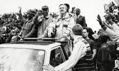 Pik Botha, standing right, attends a rally in 1994 with Mangosuthu Buthelezi and Nelson Mandela.