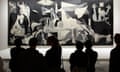 VISITORS IN FRONT OF THE GUERNICA BY PICASSO, QUEEN SOFIA MUSEUM, CALLE SANTA ISABEL, ATOCHA NEIGHBORHOOD, MADRID, SPAIN<br>BRXNCD VISITORS IN FRONT OF THE GUERNICA BY PICASSO, QUEEN SOFIA MUSEUM, CALLE SANTA ISABEL, ATOCHA NEIGHBORHOOD, MADRID, SPAIN