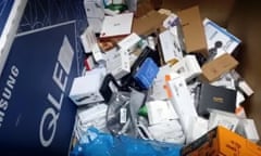 Undated handout photo issued by ITV News of various technology products they found sorted into boxes marked ‘destroy’ at the Amazon fulfilment centre in Dunfermline, Fife