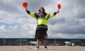 Labour’s deputy leader, Angela Rayner, marshals a plane during a visit to Stansted airport in May.