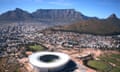 Daytime aerial view of Cape Town with Table Mountain in the background.