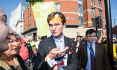 TUC lead 100,000 strong anti-austerity march in Manchester<br>04 Oct 2015, Manchester, Greater Manchester, England, UK --- Manchester, United Kingdom. 4th October 2015 -- A Conservative party delegate is egged during the march. -- A young conservative party member is egged during the TUC lead anti-austerity demonstration where 100,000 march through Manchester city centre against government austerity plans as the Conservative party conference opens. --- Image by   Christopher Middleton/Demotix/Corbis