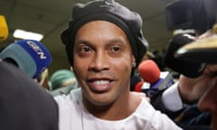 Football star Ronaldinho leaves Paraguay’s supreme court on Thursday before his arrest the following day.