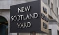 The New Scotland Yard sign outside the Metropolitan police headquarters in London.