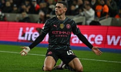 Phil Foden celebrates scoring for Manchester City