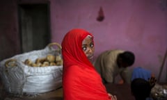 A girl is seen in a bakery