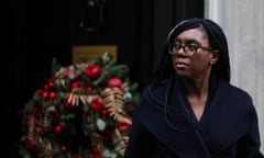 Kemi Badenoch leaving No 10 with a Christmas wreath behind her