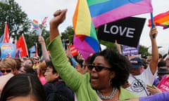 Gay rights supporters celebrate outside the U.S. Supreme Court building in Washington<br>Gay rights supporters celebrate after the U.S. Supreme Court ruled that the U.S. Constitution provides same-sex couples the right to marry, outside the Supreme Court building in Washington, June 26, 2015. The court ruled 5-4 that the Constitution’s guarantees of due process and equal protection under the law mean that states cannot ban same-sex marriages. REUTERS/Jim Bourg