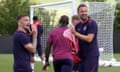 Harry Kane laughing with Kieran Trippier at England training in Germany