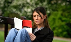 A woman reading JD Salinger's The Catcher in the Rye.