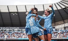 Manchester City players celebrate during their 3-1  win over Manchester United.