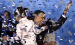 Illinois U.S. Senator-elect Barack Obama, holding his daughter Milia, 6, acknowledges applause from supporters through a flurry of confetti after giving his acceptance speech in Chicago, Tuesday, Nov. 2, 2004. Obama, only the fifth black U.S. Senator to be elected in history, defeated Republican Alan Keyes in the nation's first Senate race with two black major-party candidates. (AP Photo/M. Spencer Green)