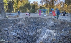 A crater caused by a Russian missile strike at a playground in Kyiv, Ukraine.