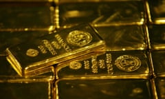 FILE PHOTO: Gold bars are displayed at South Africa’s Rand Refinery in Germiston May 30, 2006. REUTERS/Siphiwe Sibeko/File Photo GLOBAL BUSINESS WEEK AHEAD. SEARCH GLOBAL BUSINESS 5 FEB FOR ALL IMAGES