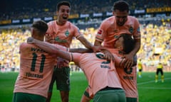 Werder Bremen celebrate after their winning goal in added time at Dortmund.