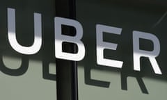 FILES-US-IT-LIFESTYLE-ECONOMY-UBER<br>(FILES) In this file photo the Uber logo is seen at the second annual Uber Elevate Summit, on May 8, 2018 at the Skirball Center in Los Angeles, California. - Uber outlined proposals on August 10, 2020 for a new type of relationship with “gig” workers, including its own drivers, that would keep them as independent contractors but with some guaranteed benefits. The ride-hailing giant described “a new model for independent platform work” in an 18-page document it hopes can be used as blueprint for Uber and similar firms relying on independent workers. (Photo by Robyn Beck / AFP) (Photo by ROBYN BECK/AFP via Getty Images)