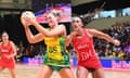Australia's Sophie Garbin evades England's Geva Mentor during the Netball World Cup final.