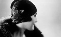 A 1930s fashion shoot showing a model in a pleated black satin hat