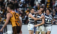 Gary Rohan celebrates kicking a Geelong goal against Hawthorn Hawks at the Melbourne Cricket Ground.