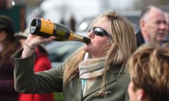 Horse Racing - 2015 Cheltenham Festival - Ladies Day - Cheltenham Racecourse<br>Charlie Iles from Tewkesbury drinks prosecco on Ladies Day during the Cheltenham Festival at Cheltenham Racecourse. PRESS ASSOCIATION Photo. Picture date: Wednesday March 11, 2015. See PA story RACING Cheltenham. Picture credit should read: Joe Giddens/PA Wire. RESTRICTIONS: Editorial Use only, commercial use is subject to prior permission from The Jockey Club/Cheltenham Racecourse. Call +44 (0)1158 447447 for further information.