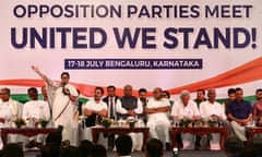 West Bengal’s chief minister, Mamata Banerjee, speaks with other leaders at a  meeting of opposition parties in Bangalore
