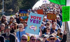 A crowd of demonstrators, some holding placards saying yes, or vote yes, in Hobart, Tasmania.