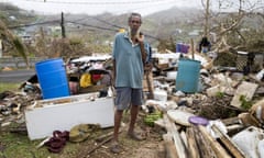 Eighty-year-old John Bristol in front of his destroyed home in Marigot, Dominica, on 27 September 2017 after Hurricane Maria