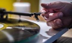 Man playing vinyl record