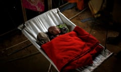 A Rohingya refugee baby girl sleeps inside her family's temporary shelter at the Balukhali refugee camp near Cox's Bazar, Bangladesh December 20, 2017. REUTERS/Alkis Konstantinidis