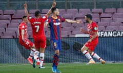 Barcelona’s Sergio Busquets looks bereft after Jorge Molina gives Granada a 2-1 lead