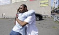 Lee Parker is hugged Wednesday by Raiza Acosta, who wanted to thank him for finding a bomb near a trash can in Elizabeth, New Jersey.