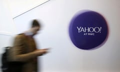 File photo of a man walking past a Yahoo logo during the Mobile World Congress in Barcelona<br>A man walks past a Yahoo logo during the Mobile World Congress in Barcelona, Spain, February 24, 2016. REUTERS/Albert Gea/File Photo/File Photo