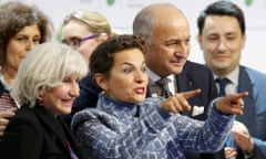 Christiana Figueres, Executive Secretary of the UN Framework Convention on Climate Change, celebrates at the conclusion of COP21 climate discussions in Paris