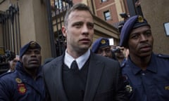 Oscar Pistorius leaves court in Pretoria after a hearing in 2014. He is serving a 13-year jail term for the murder of his girlfriend, Reeva Steenkamp.
