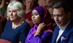 Flanked by the Duchess Of Cornwall and Oli Bell, Khadijah Mellah prepares to watch the first showing of Riding A Dream at a Brixton cinema on Monday.