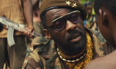 This photo provided by Netflix shows, Idris Elba,as Commandant, in the Netflix original film, "Beasts of No Nation," directed by Cary Fukunaga. (Netflix via AP)