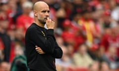 Pep Guardiola watches from the touchline