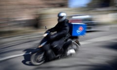 A Domino’s pizza delivery rider in west London.