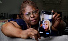 Janet Jarrett shows a photo of her sister, Pamela Jarrett, she keeps on her phone at the home they shared Friday, July 19, 2024, in Spring, Texas. Pamela Jarrett passed away after suffering heat related distress due to the power outage caused by hurricane Beryl. (AP Photo/Michael Wyke)