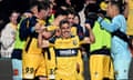 Josh Nisbet and the Mariners celebrate a goal during the A-League Men Grand Final against Melbourne Victory