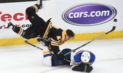 Robert Thomas takes a hit from Boston Bruins defenseman Torey Krug during the third period