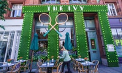 the Ivy Collection restaurant in wimbledon decked in fake grass and tennis racquets for the Wimbledon Championships