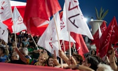 Syriza members waving flags