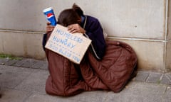 A young person begging in the street in London