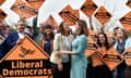 Brecon byelection winner Jane Dodds MP, centre left, and Lib Dem leader Jo Swinson MP celebrate her victory.