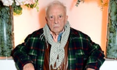 David Bailey staring at the camera in a plaid jacket